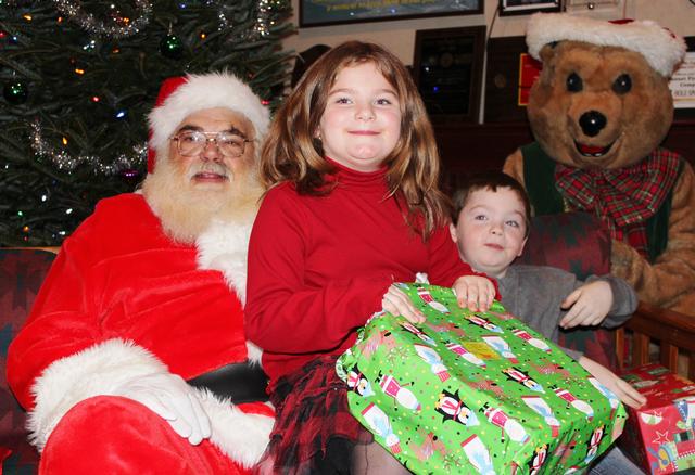 Children's Christmas Party at 8-100. 12-9-2012. Santa pays a visit . Photo by Vincent P. Tuzzolino